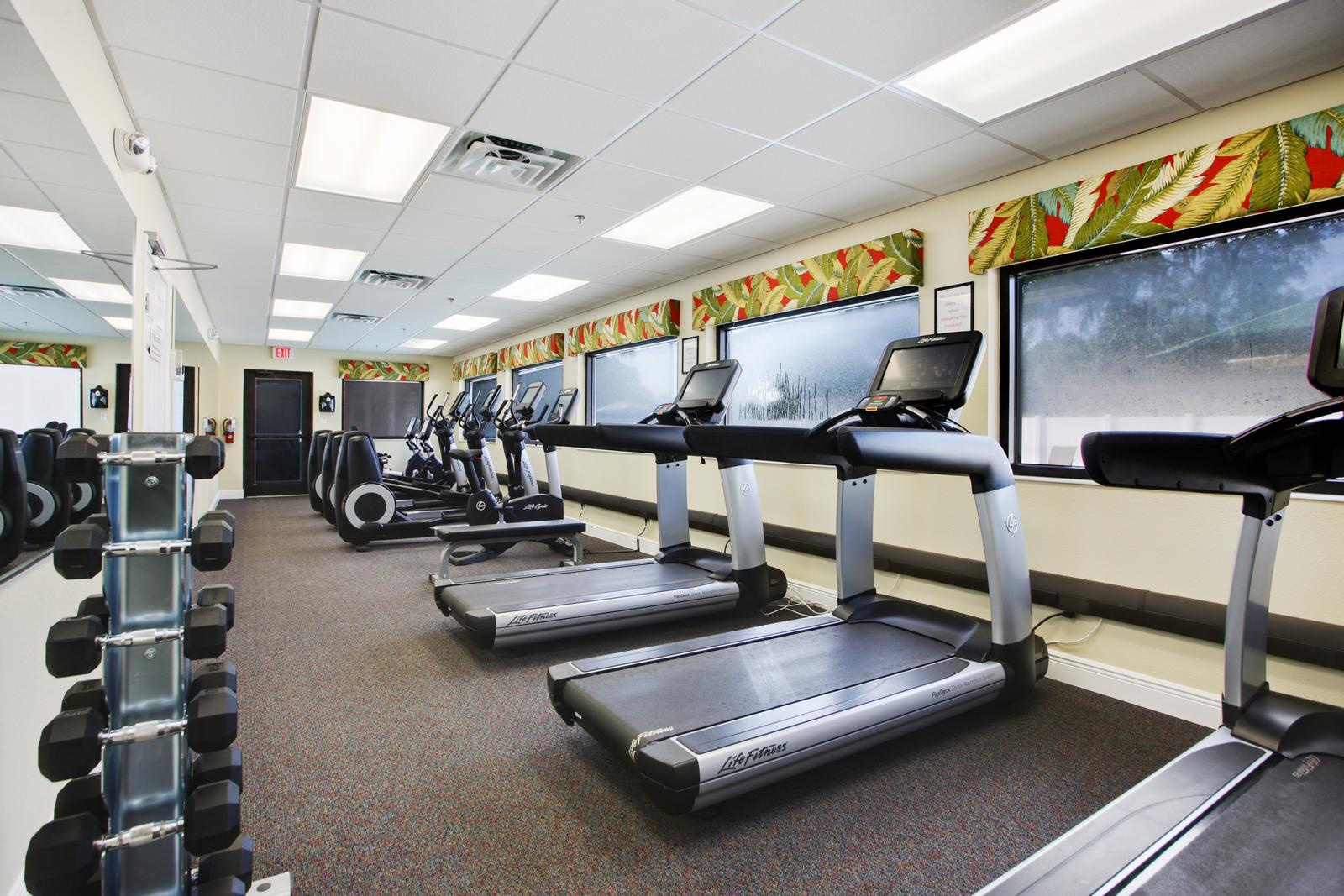 Well equipped fitness Room with treadmills, free weights and stationary bicycles.