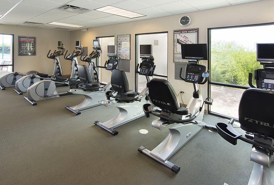 Fitness center w four bikes and 3 elliptical machines. All have their own TV