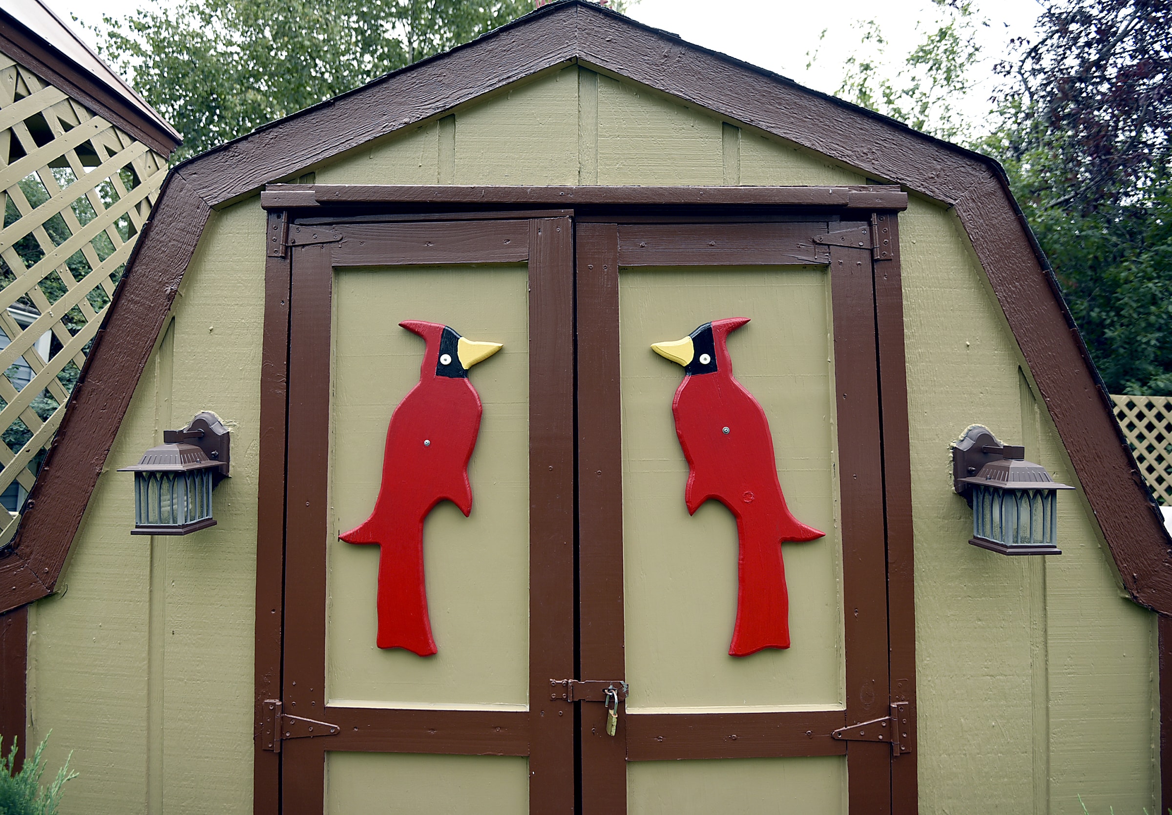The residents of Rolling Hills Estates, an all-age manufactured home community, take pride in ownership of their homes. This shed has two beautiful red cardinal birds painted on the shed doors.
