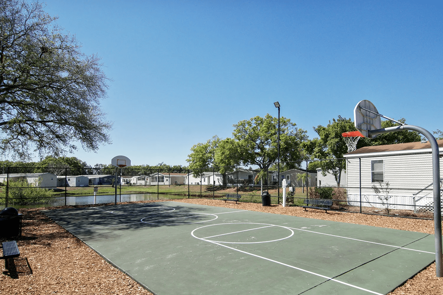 Florida Village of Tampa Basketball court and homes